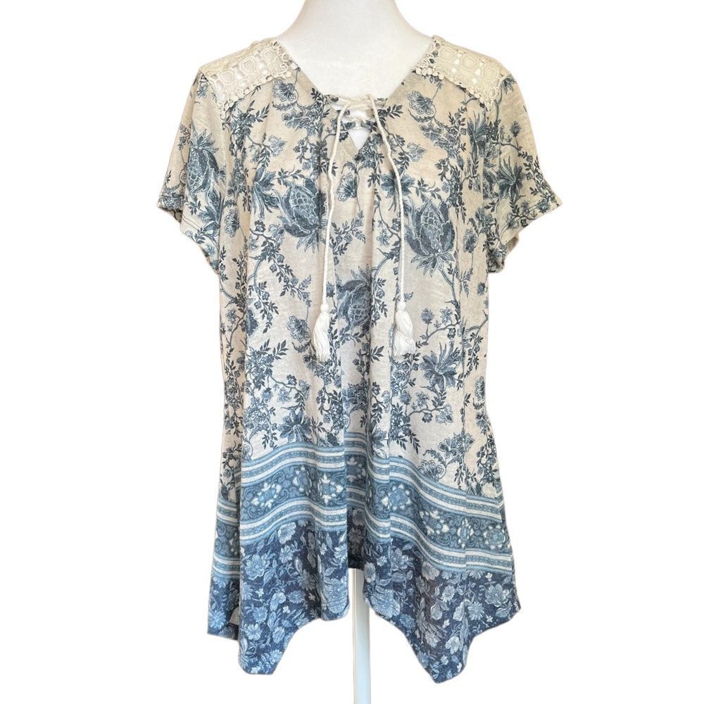 Flowy knit top with lace shoulder accent